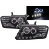 Φανάρια εμπρός Mitsubishi Pajero (2001-2006) angel eyes - μαύρα , με λάμπες (Η1) - σετ 2τμχ.