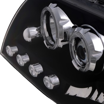 Φανάρια εμπρός Mitsubishi Pajero (2001-2006) - μαύρα , με λάμπες (Η1) - σετ 2τμχ.