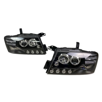 Φανάρια εμπρός Mitsubishi Pajero (2001-2006) - μαύρα , με λάμπες (Η1) - σετ 2τμχ.