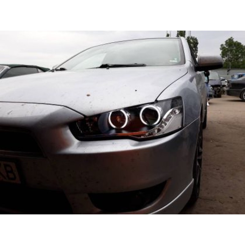 Φανάρια εμπρός led angel eyes για Mitsubishi Lancer (2008-2013) - μαύρα , με λάμπες (Η1) - σετ 2τμχ. Φανάρια εμπρός led angel eyes για Mitsubishi Lancer (2008-2013) - μαύρα , με λάμπες (Η1) - σετ 2τμχ.