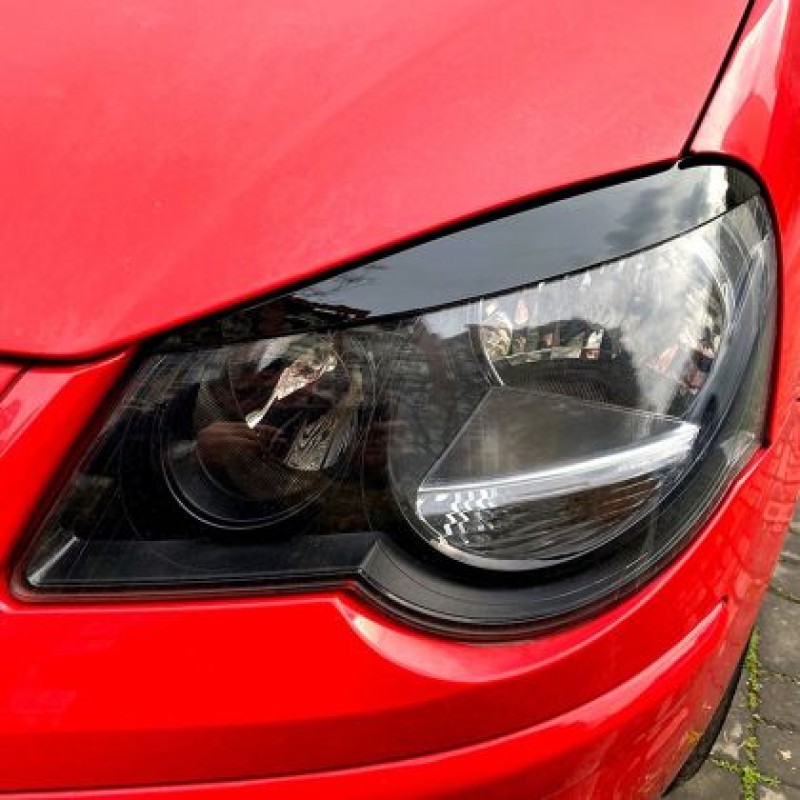 Φρυδάκια φαναριών Vw Polo (2002-2009) - μαύρα γυαλιστερά