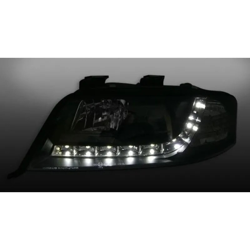 Φανάρια εμπρός Audi A6 με φώτα ημέρας (1997-2001) / Allroad 1999-2005 - μαύρα , με λάμπες (Η1) - σετ 2τμχ.