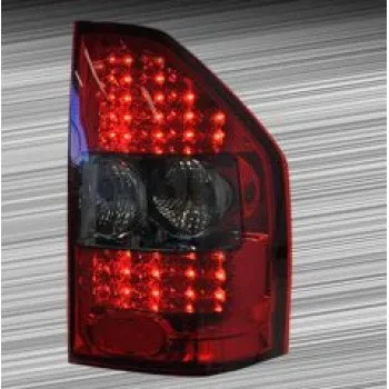 Πίσω φανάρια Mitsubishi Pajero (2001-2006) - με φιμέ φλας - σετ 2τμχ.