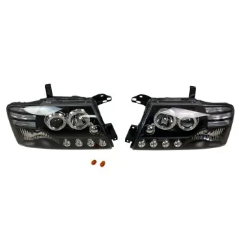 Φανάρια εμπρός Mitsubishi Pajero (2001-2006) - μαύρα , με λάμπες (Η1) - σετ 2τμχ.